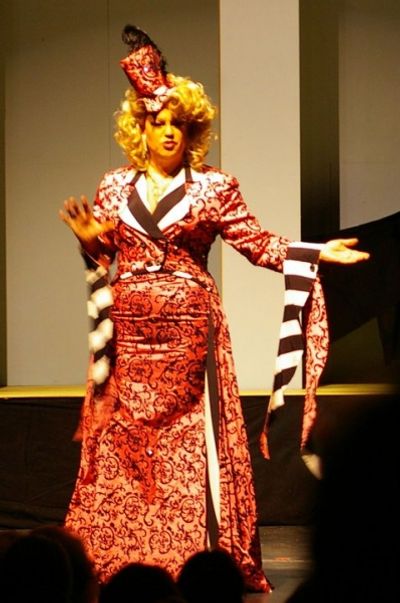 Kelvin Amburgey, as ZaZa in La Cage Aux Folles, sings "I Am What I Am" Photo